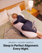 Woman sleeping on her side with Snuggi body pillow supporting her legs, hips and upper body